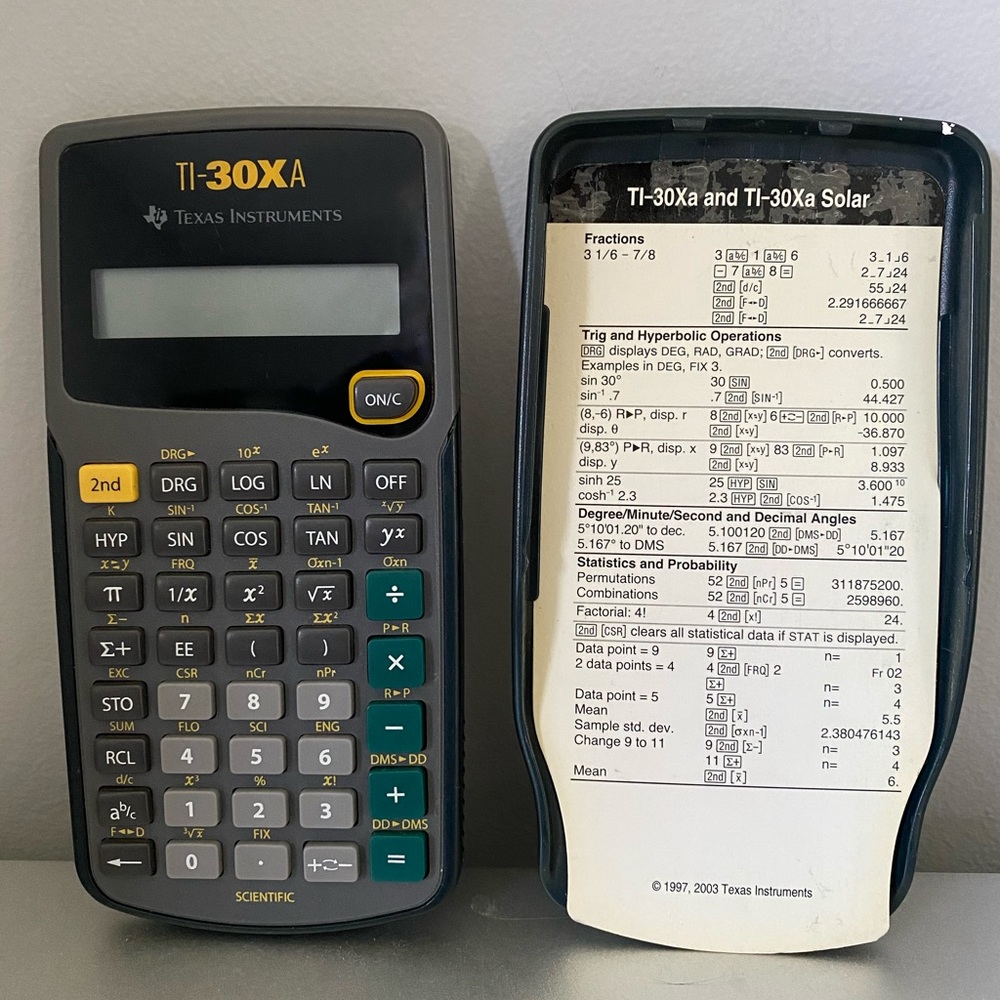 used Texas Instrument 30XA calculator
